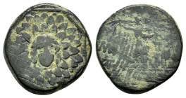 PONTOS.Amisos.(Circa 105-63 BC).Ae.

Obv : Aegis with Gorgon's head at center.

Rev : AΜΙΣΟΥ.
Nike advancing right, holding wreath and palm branch, be...