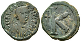 "Anastasius I AD 491-518. Constantinople
Half Follis Æ
Diademed, draped, and cuirassed bust right / Large K; cross to left, star above and below, Δ to...