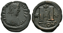 ANASTASIUS I.(491-518).Constantinople.Follis.
*Repatinated*
Condition : Good very fine.

Weight :16.58 gr
Diameter :30.27 mm