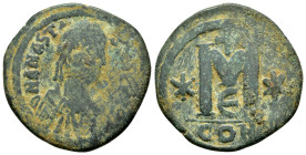 ANASTASIUS I.(491-518).Constantinople.Follis.
Obv : DN ANASTASIVS PP AVG.
Pearl diademed, draped, cuirassed bust to right.
Rev : Large M, star left, c...