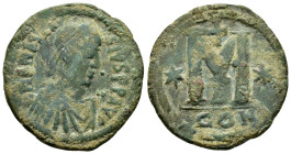 JUSTIN I. 518-527 AD.Constantinople Mint.AE Follis
Obverse : DN IVSTINVS PP AVG; pearl diademed, draped, cuirassed bust right
Reverse : Large M, star ...