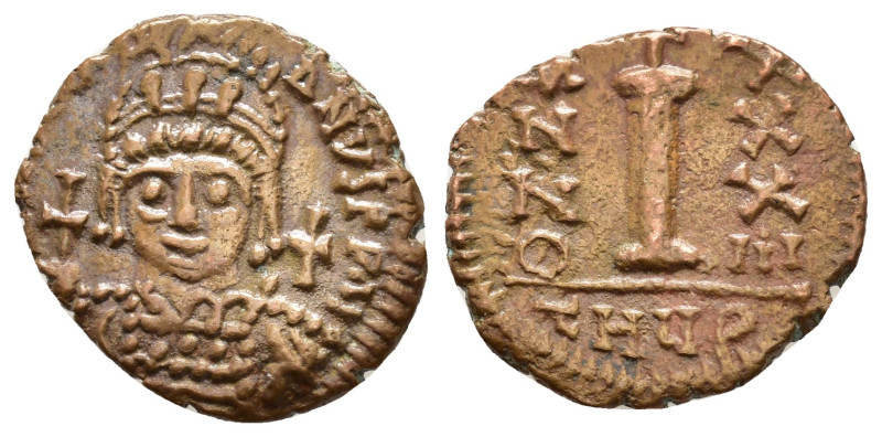 JUSTINIAN I.527-565 AD.Antioch mint.AE Decanummium. DN IVSTINIANVS PP AVG, helme...