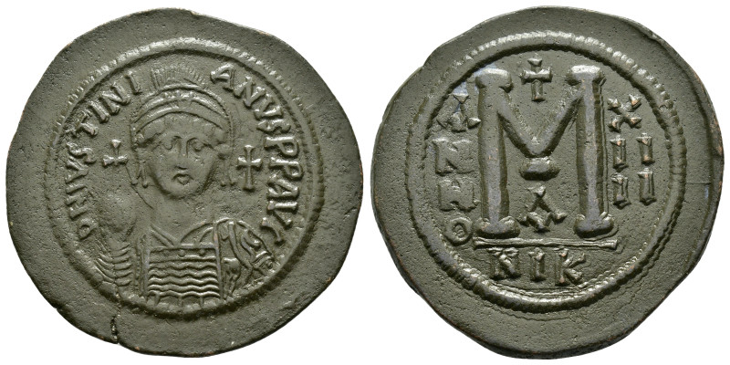JUSTINIAN I.(527-565).Nicomedia.Follis.
Obv : DN IVSTINIANVS PP AVG.
Helmeted,...