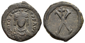 "TIBERIUS II CONSTANTINE.(578-582).Constantinople.Ae.
Obv : Dm TIb CONSTAN P P AV.
Crowned, draped, and cuirassed bust of Tiberius II Constantine faci...