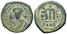 TIBERIUS II CONSTANTINE.(578-582).Constantinople.Follis.
Obv : d m TIb CONSTANT P P AVI.
Crowned facing bust, wearing consular robes and holding mappa...