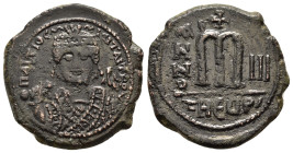 "Maurice Tiberius, 582-602. Follis Theoupolis (Antioch). Crowned bust of Maurice Tiberius facing, wearing consular robes, holding mappa with his right...