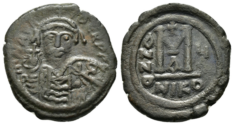 MAURICE TIBERIUS.(582-602). Nicomedia.Follis.
Obv : D N MAVR BIRЄ P P.
Helmeted ...