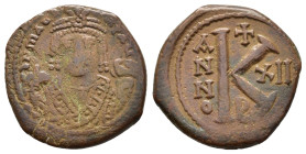 MAURICE TIBERIUS.582-602 AD.Antioch mint.AE Half Follis.DN MAV G I CN P AVG, Bust facing, wearing crown with trefoil ornament, and consular robes; in ...