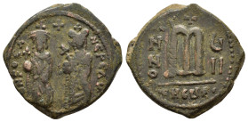PHOCAS with LEONTIA (602-610). Theoupolis (Antioch).Follis.
Obv : D N FOCA NЄ PЄ AV.
Phocas, holding globus cruciger, and Leontia, holding cruciform s...