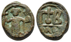 CONSTANS II.(641-668).Alexandria.Dodecanummium.
Obv : Constans II standing facing, wearing chlamys and crown, holding long staff in right hand and glo...