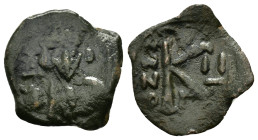 TIBERIUS III APSIMAR (698-705).Constantinople.Follis.
*Repatinated*
Condition : Good very fine.

Weight : 2.59 gr
Diameter : 20.80 mm