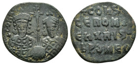 CONSTANTINE VII PORPHYROGENITUS with ROMANUS I (913-959). Follis. Constantinople. Obv: Crowned facing busts of Constantine and Romanus, holding betwee...