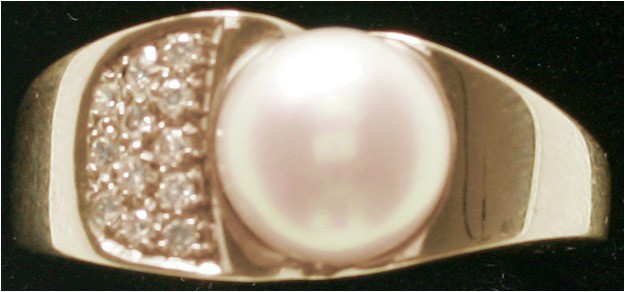 Fingerringe
Damenring Gelbgold 585 mit großer Perle (8 mm) und 12 kleinen Brill...