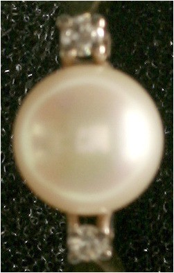 Fingerringe
Damenring, Gelbgold 585 mit Perle und zwei kleinen Brillianten. Rin...