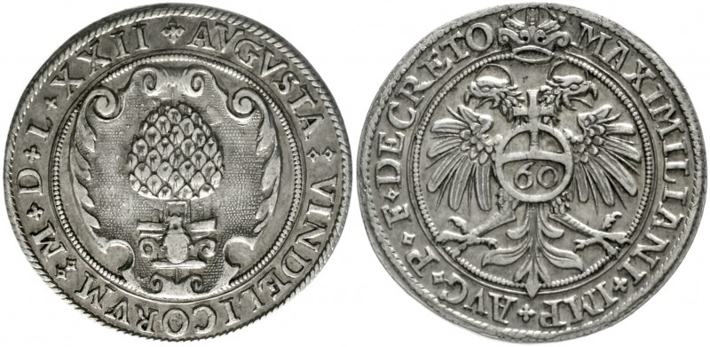 Augsburg-Stadt
Guldentaler zu 60 Kreuzern 1572. Pyr auf Podest in muschelartige...