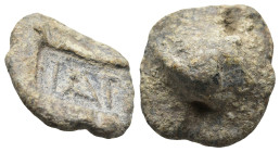 Roman Lead Seal
(6g 16,4mm diameter)
Obv: TAT within incuse square