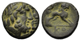 Pisidia, Komama, c. 1st Century BC. Æ (12,8mm, 2g). Jugate, bearded heads r. R/ Lion springing right; in ex., KO. SNG von Aulock 5064.