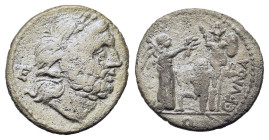 C. Fundanius, Rome, 101 BC. AR Quinarius (14,4mm, 1.6g). Laureate head of Jupiter r.; control mark to l. R/ Victory standing r., crowning trophy, besi...