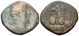 Commodus (177-192). Æ Sestertius (29mm, 20,06g, 6h). Rome, AD 189. Laureate head r.; R/ Victory flying l., holding open wreath over two shields which ...