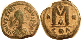 JUSTINIAN I, Follis, S-160, Bust r/*M* CON-A; Strong F+, centered, full lgnd, dark green with strong earthen contrast. (A Ch. F+ brought $41 on $56 bi...