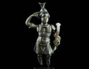A ROMAN BRONZE STATUETTE OF MARS
Circa 2nd-3rd century AD.
Mars, the god of war and agriculture, is shown standing in full armour, with high-crested C...