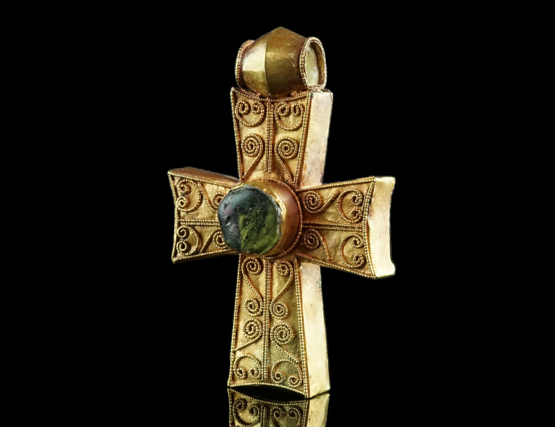 A FINE EARLY BYZANTINE DECORATED GOLD CROSS
Circa 5th-7th century AD.
Highly ela...