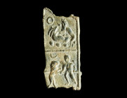A SMALL ROMAN LEAD PLAQUE WITH A RARE FIGURATIVE DESIGN
Circa 1st-3rd century AD.
The top register shows the woodland god Pan having sex with a she-go...