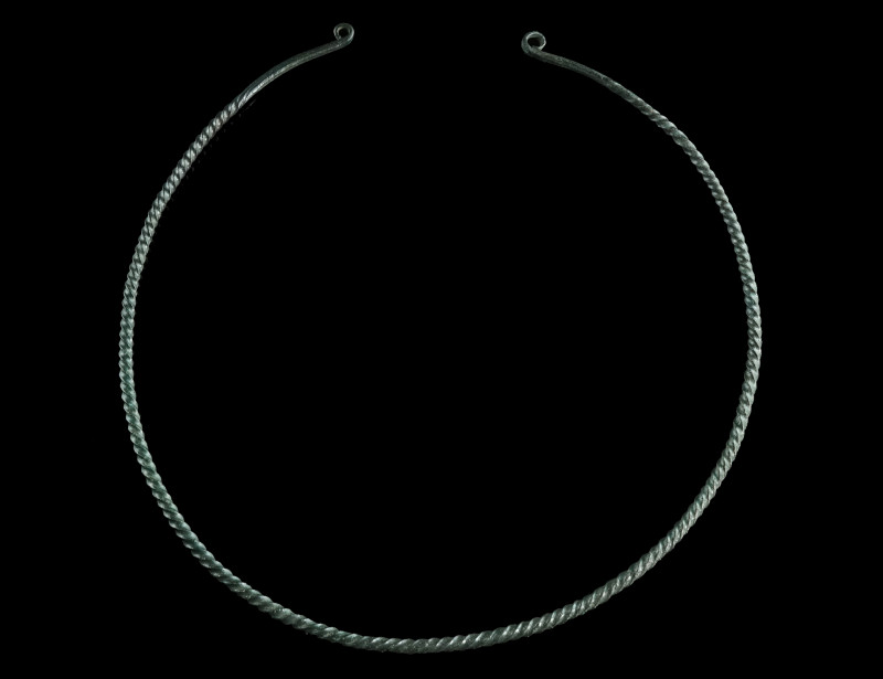 A EUROPEAN LATE BRONZE AGE TWISTED TORQUE
Circa 1000-800 BC.
Twisted hoop of sol...
