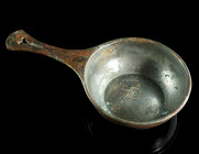 A ROMAN BRONZE CASSEROLE WITH MAKER'S MARK
Circa 1st century AD.
Saucepan with silvered interior; remains of silvering on the outside. With a maker's ...