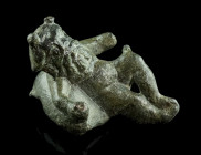 A ROMAN BRONZE FIGURE OF SILENUS RECLINING ON A WINE-SKIN
Circa 2nd-3rd century AD.
Silenus, a rustic god of wine-making and drunkenness, is shown rec...