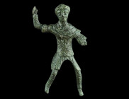 A ROMAN BRONZE STATUETTE OF A THRACIAN HORSEMAN
Circa 2nd-3rd century AD.
The hero with long hair tied into a knot at the back of the head is shown we...
