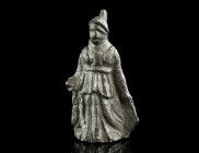 A SMALL ROMAN SILVER STATUETTE OF ATHENA PARTHENOS
Circa 1st-2nd century AD.
The standing goddess is wearing a girded peplos and an Attic helmet. She ...