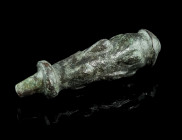 A ROMAN BRONZE CLUB OF HERCULES
Circa 2nd-3rd century AD.
Probably a votive offering or an amulet.
L 42 mm Ex European private collection, acquired on...