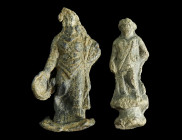 TWO SMALL ROMAN LEAD STATUETTES OF GODDESSES
Circa 2nd-3rd century AD.
The larger figure holding a patera and standing on a flat base, the smaller fig...