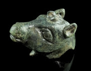 A ROMAN BRONZE HORSE HEAD
Circa 3rd-4th century AD.
Hollow cast head with large eyes, pointed ears and a detailed mane. Filled with lead. Probably par...