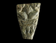 A SMALL ROMAN DECORATED LEAD PLAQUE
Circa 1st-2nd century AD.
A fine lead plaque depicting an ornate water basin (labrum) surmounted by two dolphins a...