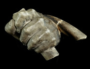 A MARBLE HAND FROM A STATUE
Circa 16th-17th century AD.
Finely modelled male hand holding an attribute/implement, from a well under-life-sized statue;...