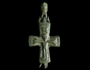 A BYZANTINE BRONZE RELIQUARY CROSS WITH CHRIST AND MARY
Circa 10th-12th century AD.
A provincial reliquary cross (enkolpion) depicting in a highly sty...
