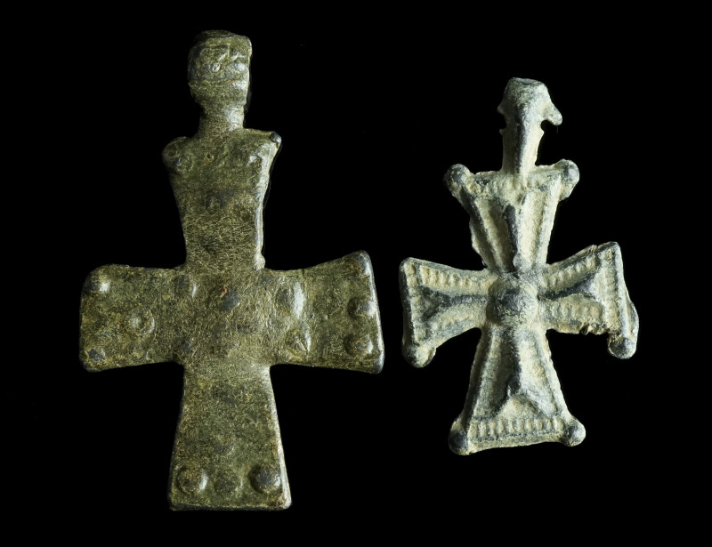 TWO INSCRIBED BYZANTINE LEAD CROSS PENDANTS
Circa 9th-12th century AD.
The small...