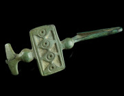 A CELTIC LA TENE PERIOD BRONZE FIBULA
Circa 3rd century BC.
The foot is bent upwards and attached to the bow. The bow is decorated with a rectangular ...