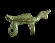 A LATE ANTIQUE UNFINISHED BRONZE CASTING OF A BIRD BROOCH
Circa 4th-6th century AD.
Unfinished casting of a bird brooch with folded wings. The bronze ...