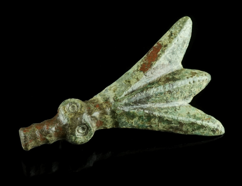 A EUROPEAN MIGRATION PERIOD BRONZE CICADA BROOCH
Circa 5th-6th century AD.
Plate...