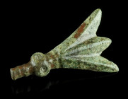 A EUROPEAN MIGRATION PERIOD BRONZE CICADA BROOCH
Circa 5th-6th century AD.
Plate brooch in the shape of a stylised cicada. Worked in relief, the eyes ...