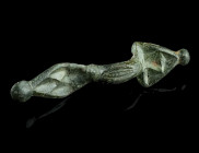 A EUROPEAN MIGRATION PERIOD BRONZE BROOCH
Circa 5th century AD.
Bow brooch with triangular head plate and lozenge-shaped foot; decorated with chip car...