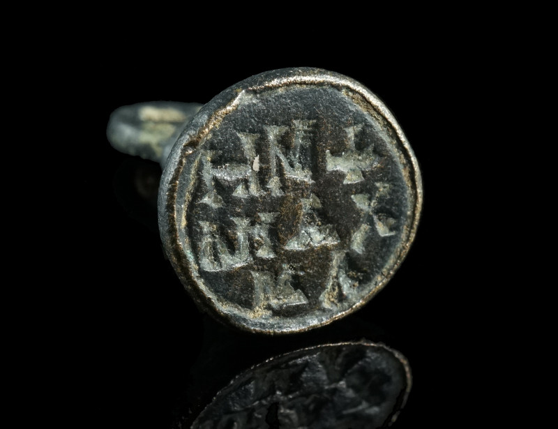 A BYZANTINE BRONZE STAMP SEAL WITH INSCRIPTION
Circa 10th-12th century AD.
Conic...