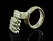 A ROMAN BRONZE KEY RING
Circa 1st-3rd century AD.
With a short projecting shank and an offset key bit. 
L 31 mm Ex Austrian private collection, acquir...