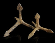 TWO MEDIEVAL IRON CALTROPS
Circa 13th-16th century AD.
An area denial weapon with four sharp spikes arranged in such a manner that one of them always ...