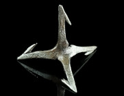 A MEDIEVAL IRON BARBED CALTROP
Circa 13th-15th century AD.
An area denial weapon with four sharp barbed spines arranged in such a manner that one of t...