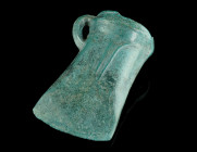 A EUROPEAN LATE BRONZE AGE SOCKETED AXE HEAD
Circa 1000-800 BC.
Socketed and looped bronze axe head with double-banded collar and ribbed decoration.
L...