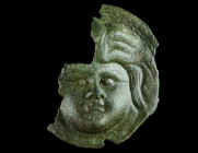A ROMAN BRONZE APPLIQUE WITH MEDUSA
Circa 2nd-3rd century AD.
Fragmentary round applique with a head of Medusa. Surface treated with a thin layer of p...